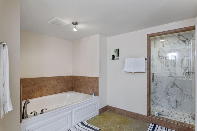 full bath featuring baseboards, a shower stall, a bath, and visible vents