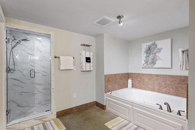 full bath featuring a marble finish shower, baseboards, a garden tub, and visible vents