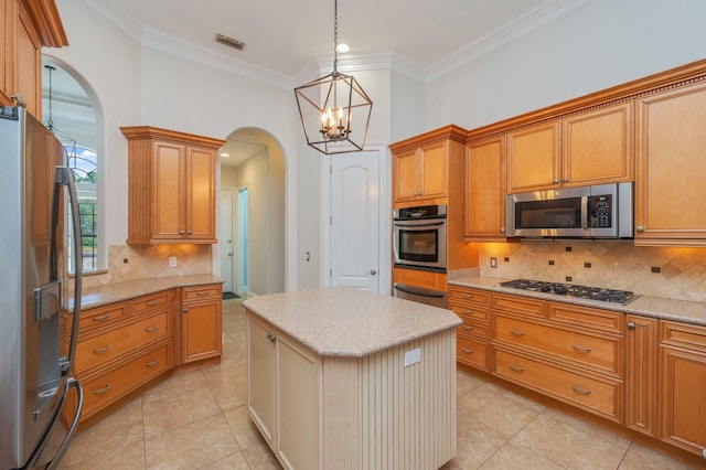 4594 Nautical Ct, Destin, FL 32541 - kitchen featuring visible vents, appliances with stainless steel finishes, tasteful backsplash, arched walkways, and a warming drawer