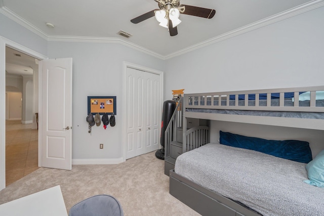4594 Nautical Ct, Destin, FL 32541 - carpeted bedroom with ceiling fan, visible vents, crown molding, baseboards, and a closet
