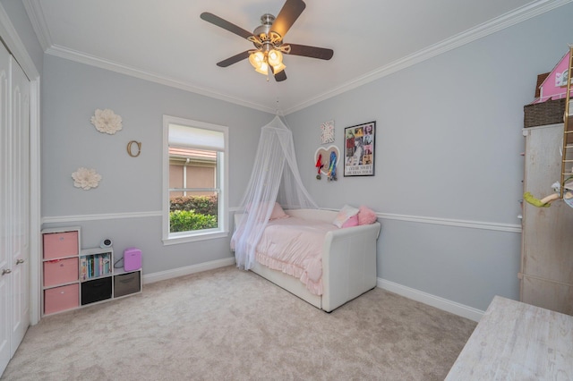 4594 Nautical Ct, Destin, FL 32541 - carpeted bedroom featuring crown molding, baseboards, ceiling fan, and a closet