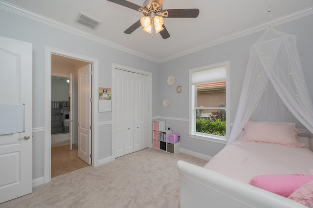 4594 Nautical Ct, Destin, FL 32541 - carpeted bedroom featuring baseboards, visible vents, ornamental molding, and a closet