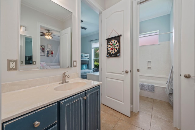 4594 Nautical Ct, Destin, FL 32541 - full bathroom with ceiling fan, tile patterned flooring, vanity, ornamental molding, and ensuite bath