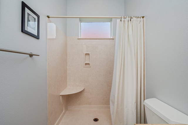 4594 Nautical Ct, Destin, FL 32541 - bathroom featuring a stall shower and toilet