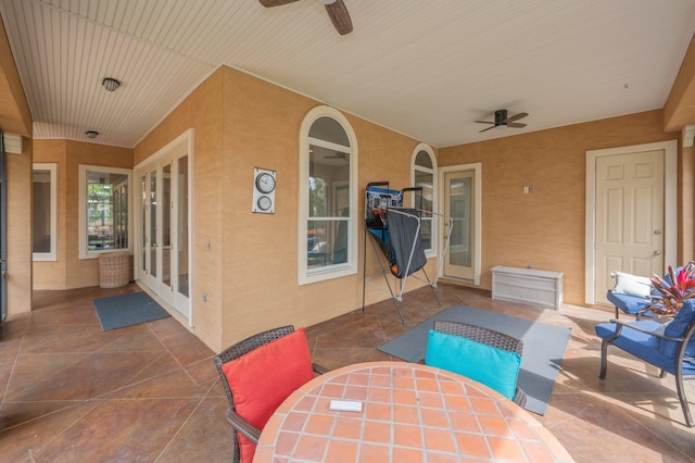 4594 Nautical Ct, Destin, FL 32541 - view of patio featuring outdoor dining area and a ceiling fan
