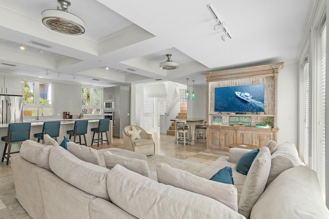 4835 Ocean Blvd, Destin, FL 32541 - living area featuring visible vents, coffered ceiling, stairs, rail lighting, and ornamental molding