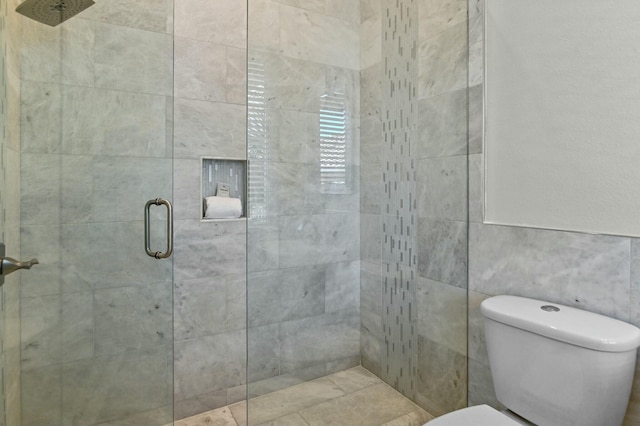4835 Ocean Blvd, Destin, FL 32541 - bathroom with tile walls, toilet, and tiled shower