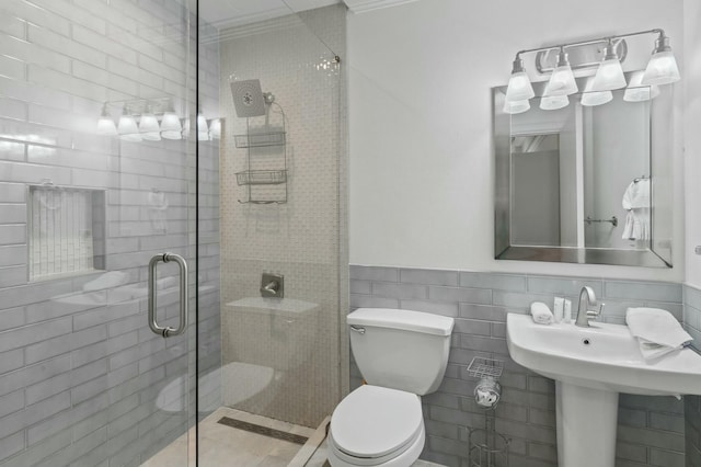 4835 Ocean Blvd, Destin, FL 32541 - full bath with tile walls, toilet, a sink, and a stall shower