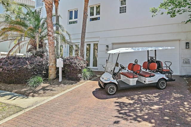 4835 Ocean Blvd, Destin, FL 32541 - view of home's exterior with a garage and decorative driveway