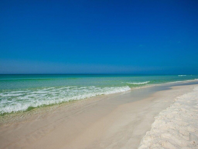 property view of water with a beach view
