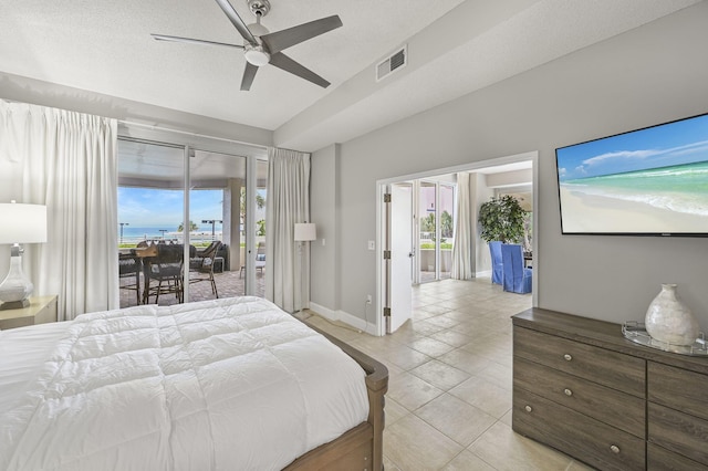 bedroom featuring access to outside, light tile patterned floors, a ceiling fan, visible vents, and baseboards