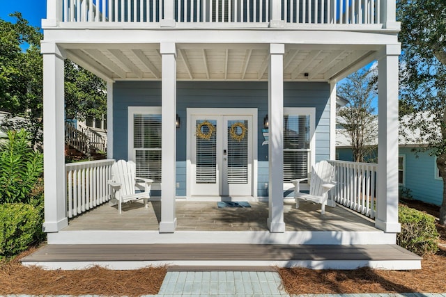 wooden terrace featuring french doors