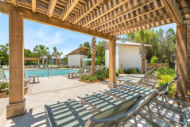 LOT35 String Lily Cv, Santa Rosa Beach, FL 32459 - view of patio featuring a community pool, fence, and a pergola