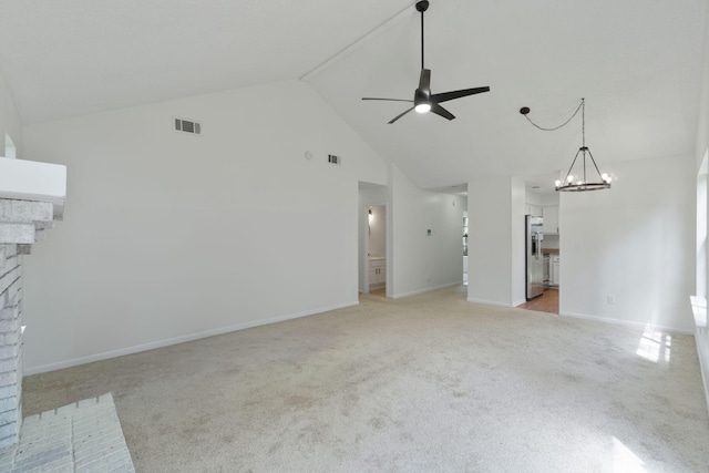 2106 Wilderness Path, Fort Walton Beach, FL 32547 - unfurnished living room with a ceiling fan, light colored carpet, a chandelier, high vaulted ceiling, and a fireplace