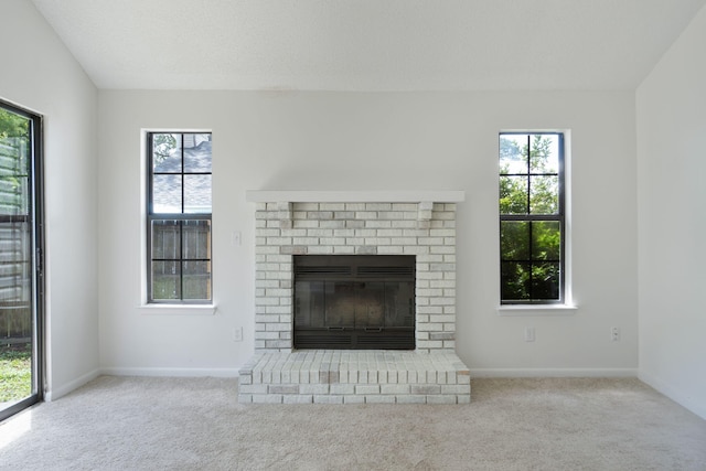 2106 Wilderness Path, Fort Walton Beach, FL 32547 - unfurnished living room with carpet flooring, healthy amount of natural light, and a fireplace