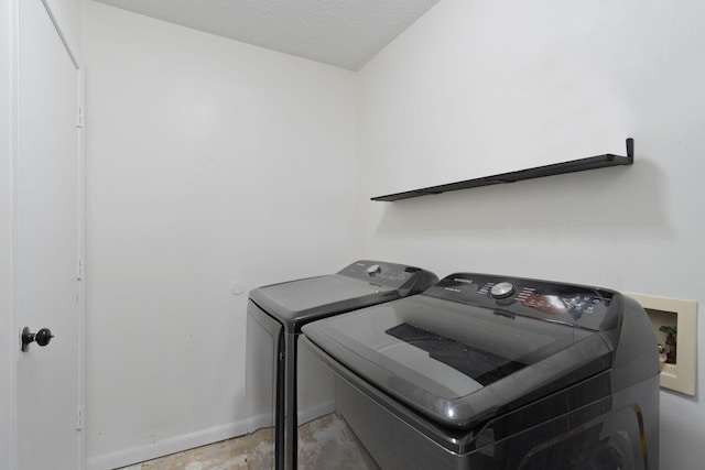 2106 Wilderness Path, Fort Walton Beach, FL 32547 - laundry area with washing machine and clothes dryer and baseboards