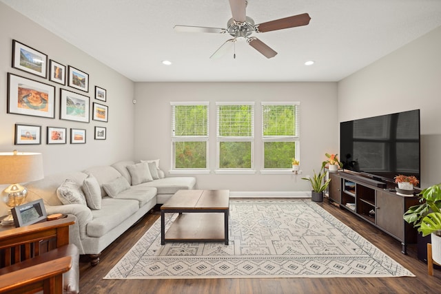 living area featuring recessed lighting, ceiling fan, baseboards, and wood finished floors