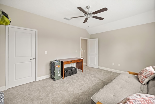 living area with ceiling fan, visible vents, vaulted ceiling, carpet floors, and baseboards
