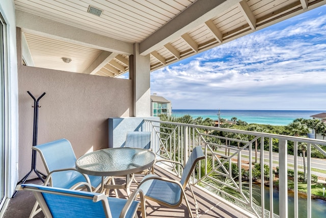 balcony featuring a water view