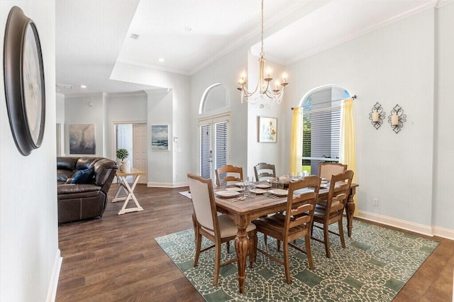 dining area with a chandelier, crown molding, dark wood-style flooring, and baseboards