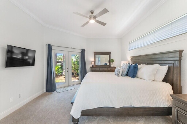 carpeted bedroom with access to outside, baseboards, ornamental molding, french doors, and a ceiling fan