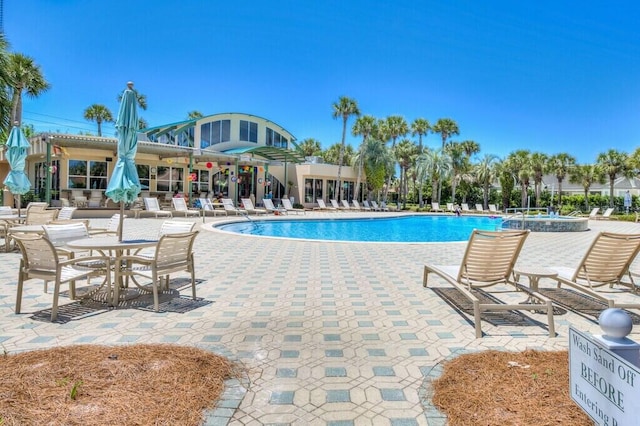 pool featuring a patio area