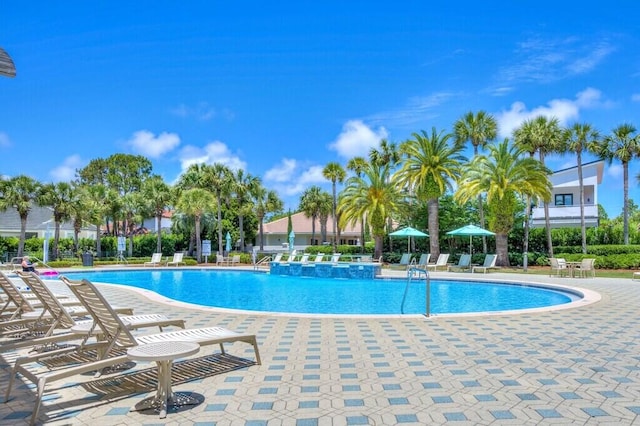 community pool featuring a patio
