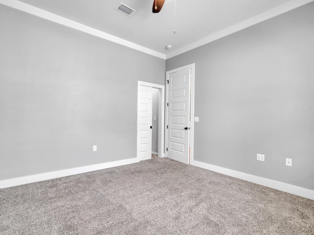 1160 Deer Moss Loop, Niceville, FL 32578 - spare room featuring a ceiling fan, baseboards, carpet, and visible vents