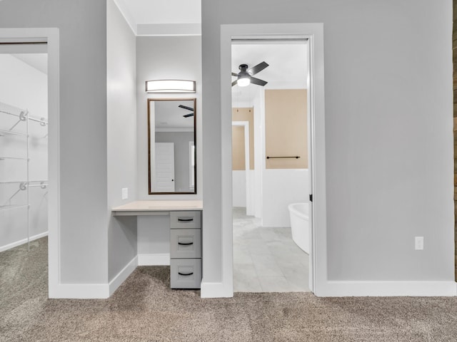 1160 Deer Moss Loop, Niceville, FL 32578 - spacious closet featuring built in study area, carpet flooring, and a ceiling fan
