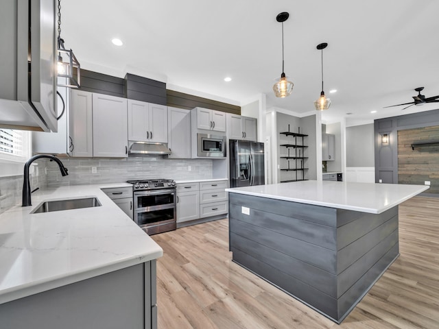 1160 Deer Moss Loop, Niceville, FL 32578 - kitchen featuring tasteful backsplash, a sink, under cabinet range hood, recessed lighting, and stainless steel appliances