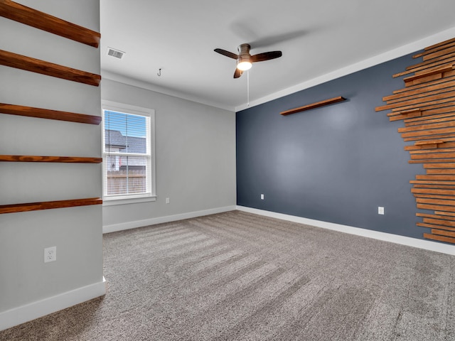 1160 Deer Moss Loop, Niceville, FL 32578 - carpeted spare room featuring visible vents, baseboards, and a ceiling fan