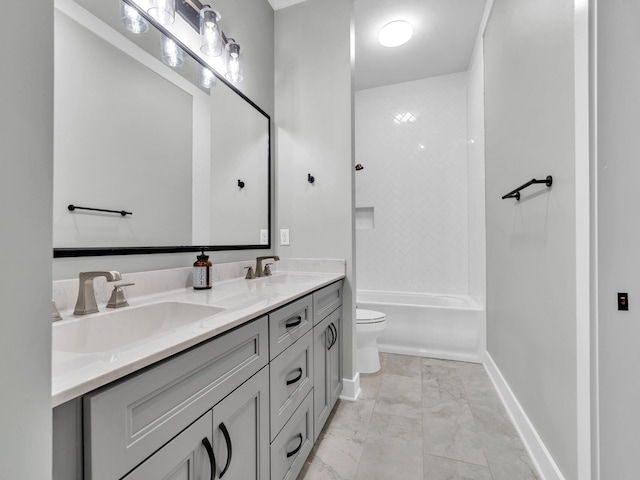 1160 Deer Moss Loop, Niceville, FL 32578 - bathroom with a sink, toilet, double vanity, and marble finish floor