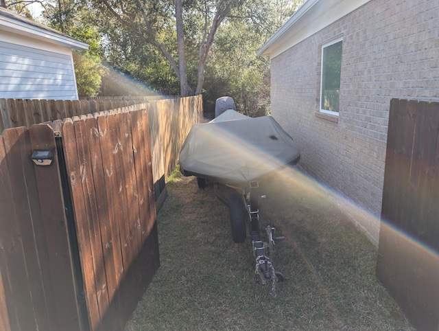 1160 Deer Moss Loop, Niceville, FL 32578 - view of home's exterior featuring fence and brick siding