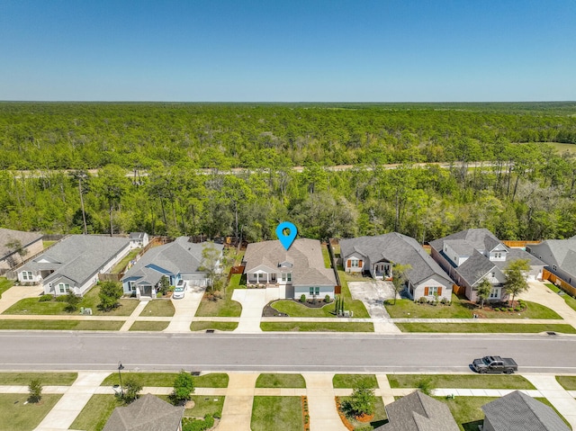 1160 Deer Moss Loop, Niceville, FL 32578 - birds eye view of property featuring a wooded view and a residential view