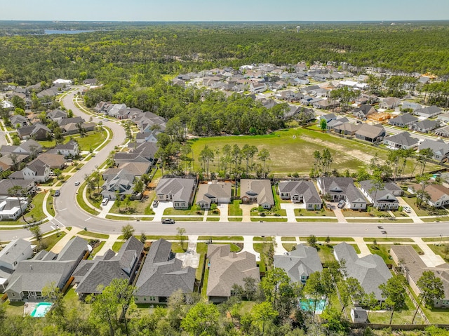 1160 Deer Moss Loop, Niceville, FL 32578 - drone / aerial view featuring a wooded view and a residential view