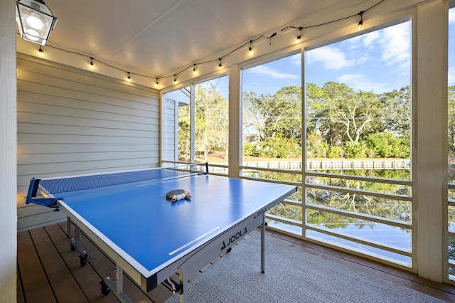 8855 Baypine Dr, Miramar Beach, FL 32550 - playroom featuring track lighting, wood finished floors, and wooden walls