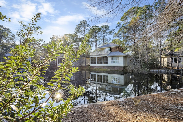 8855 Baypine Dr, Miramar Beach, FL 32550 - rear view of property featuring a sunroom