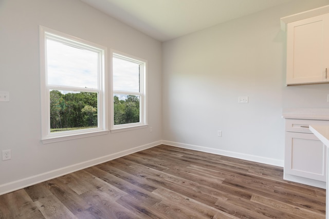 6117 Tansey St, Crestview, FL 32539 - empty room featuring wood finished floors and baseboards