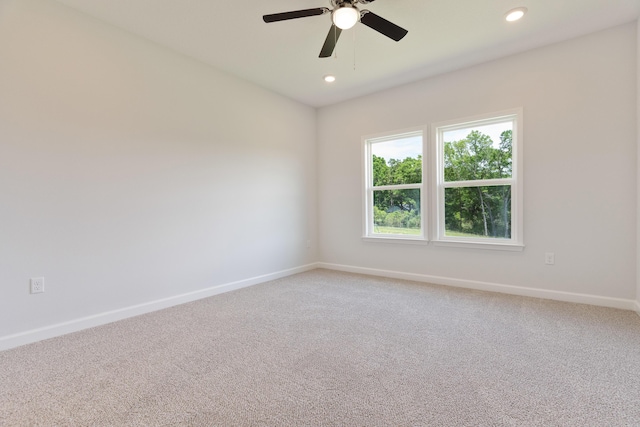 6117 Tansey St, Crestview, FL 32539 - empty room featuring a ceiling fan, baseboards, recessed lighting, and light colored carpet