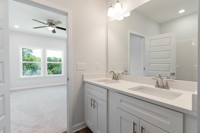 6117 Tansey St, Crestview, FL 32539 - full bathroom featuring double vanity, baseboards, and ceiling fan