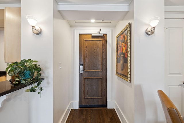 doorway featuring baseboards and dark wood-style floors