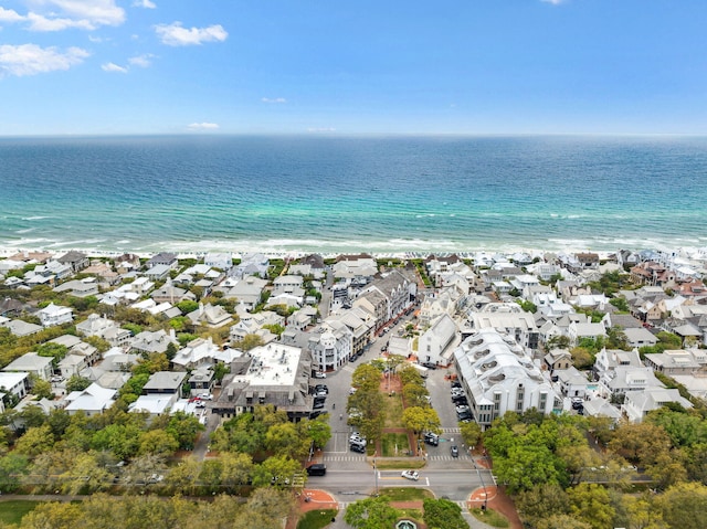 aerial view featuring a water view, a residential view, and a beach view