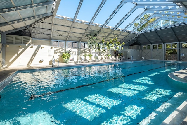 community pool featuring a lanai and a patio area