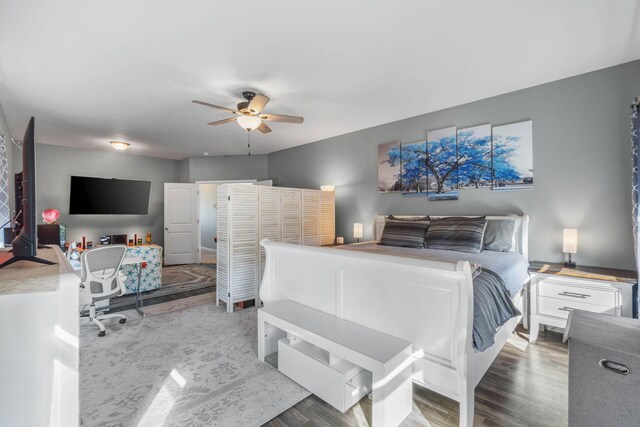 730 Cornelia St, Freeport, FL 32439 - bedroom with wood finished floors and ceiling fan
