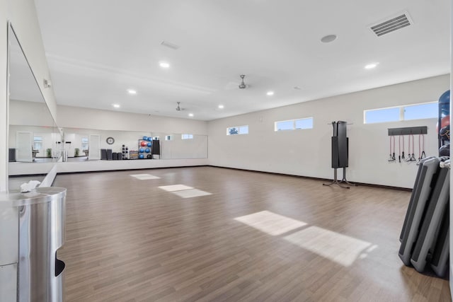 730 Cornelia St, Freeport, FL 32439 - exercise room with light wood finished floors, recessed lighting, plenty of natural light, and baseboards