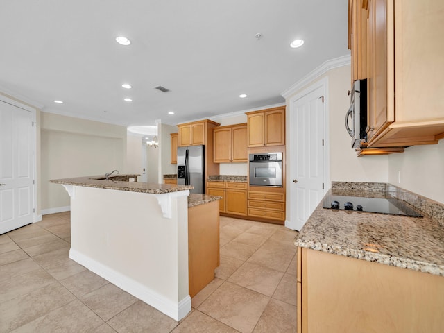 kitchen with a center island with sink, recessed lighting, ornamental molding, and stainless steel appliances