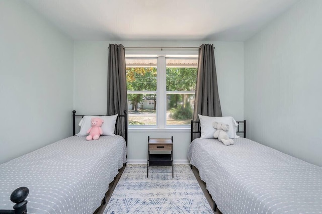 bedroom with baseboards