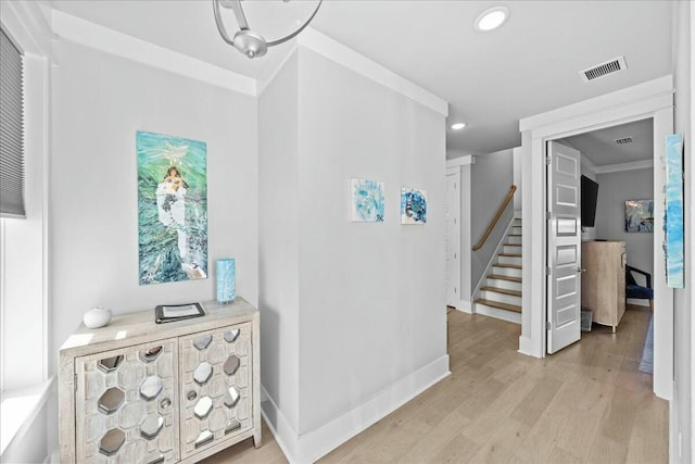 186 Ciboney St, Miramar Beach, FL 32550 - hall featuring light wood-style flooring, visible vents, recessed lighting, stairway, and baseboards