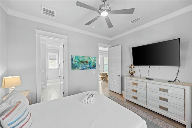 186 Ciboney St, Miramar Beach, FL 32550 - bedroom featuring a ceiling fan, ensuite bathroom, ornamental molding, and visible vents