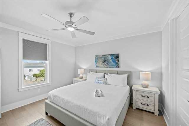 186 Ciboney St, Miramar Beach, FL 32550 - bedroom featuring crown molding, wood finished floors, ceiling fan, and baseboards